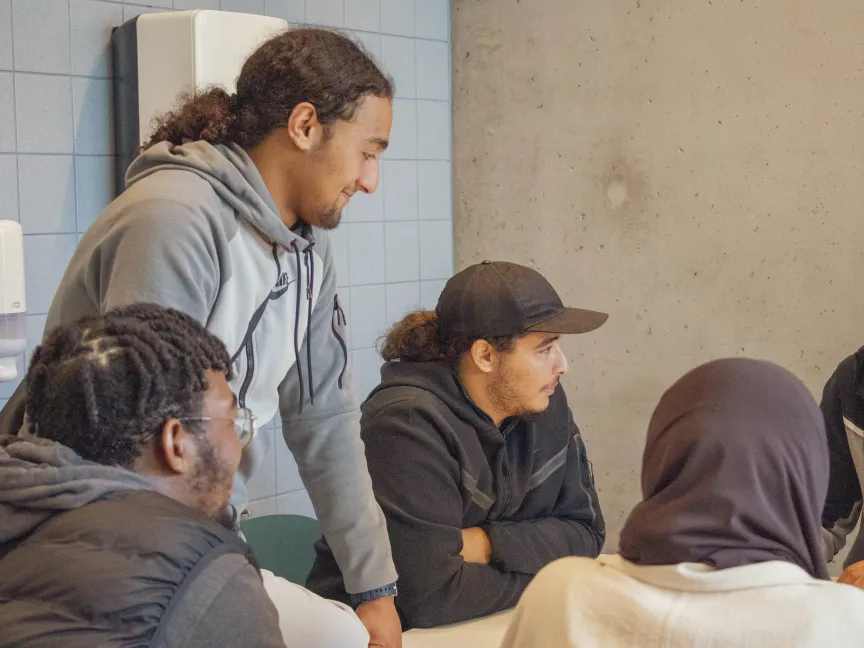 men engaged in discussion